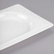 A white rectangular porcelain tray with a square edge.