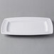A white rectangular Libbey porcelain plate on a gray background.