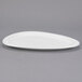 A close up of a Libbey white porcelain oval plate.