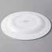A white Libbey porcelain plate with a circular rim.