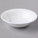A Libbey Royal Rideau white porcelain bowl on a white surface.