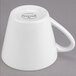 A white porcelain Libbey tea cup with a handle.
