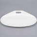 A white oval porcelain plate with a handle.