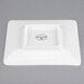 A white square Libbey porcelain plate.