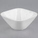 A close up of a white square Libbey Royal Rideau porcelain bowl.