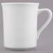 A close-up of a Libbey white mug with a handle.