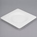 A white square Libbey porcelain plate with a wide white rim.