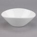 A Libbey Royal Rideau white porcelain bowl with a small rim on a gray background.