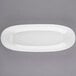 A white rectangular Libbey porcelain plate with a rim.