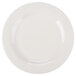 A close-up of a white Reserve by Libbey porcelain plate with a curved white rim.