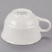 A white Libbey Royal Rideau low porcelain tea cup with a handle.