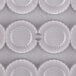 A close-up of a Chocolate World polycarbonate cup chocolate mold with 24 circles.