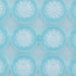 A close up of a blue plastic Matfer Bourgeat chocolate mold with circles.
