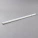 A white Satco T8 fluorescent light tube on a gray surface.
