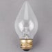 A close-up of a Satco clear decorative incandescent light bulb.