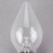 A Satco clear incandescent rough service light bulb with a pointy tip.