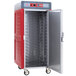A red and silver Metro insulated stainless steel hot holding cabinet with a door.