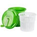 A green plastic container with a white basket and lid.