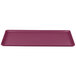 A burgundy rectangular tray with a white border.