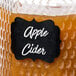 A jar of apple cider with a Choice decorative chalkboard label on it.