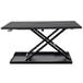 A black Luxor adjustable stand up desk with metal legs.