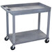 A gray Luxor plastic utility cart with wheels.