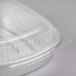 A Durable Packaging aluminum foil container with a clear dome lid.