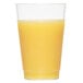 A WNA Comet Classicware tall clear plastic tumbler filled with orange juice on a white background.