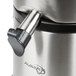 A close up of a stainless steel AvaMix juicer with a rubber spout cap.