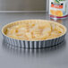 Wilton 2105-450 Excelle Elite 11" x 1 1/8" Fluted Non-Stick Tart / Quiche Pan with Removable Bottom Main Thumbnail 1