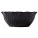 A black Cambro polycarbonate bowl with wavy lines on it.