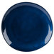 A close up of a blue GET Cosmo melamine plate with a rim.
