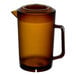 A brown SAN pitcher with a handle and lid.