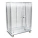 A Metro heavy duty chrome wire security cage on wheels.