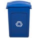 A blue Rubbermaid recycling bin with a blue slotted lid.