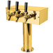 A gold metal Micro Matic beer tap with black handles.