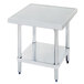 An Advance Tabco stainless steel mixer table with undershelf.