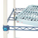 A MetroMax shelf cart with open grid shelves and polyurethane casters.