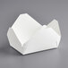 A white Choice folded paper take-out container with the lid open.