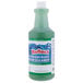 A bottle of Noble Chemical Reflect Super Concentrated Window Cleaner with a green cap.