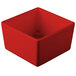 A red square Tablecraft bowl with a white background.