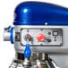 A blue and silver Vollrath 20 qt. Planetary stand mixer with red accents.