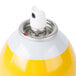 A PAM spray can with a white and yellow cap.