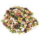 A pile of different colored dried beans on a white background.
