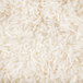 A pile of Organic White Jasmine Rice on a white background.