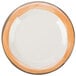 A white plate with a wide rim and orange trim.