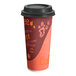 A Choice paper hot cup with a coffee design and black lid.