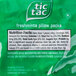 A green Tic Tac pillow pack with white text containing individually wrapped mints.