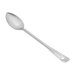 A Vollrath stainless steel basting spoon with a silver handle on a white background.