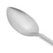 A Vollrath stainless steel basting spoon with a silver handle.
